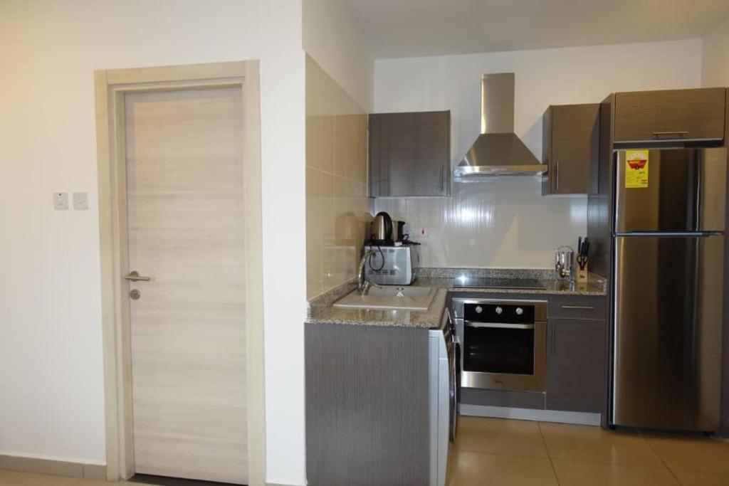 The Gallery Luxury Suites Cpg East Legon Esterno foto