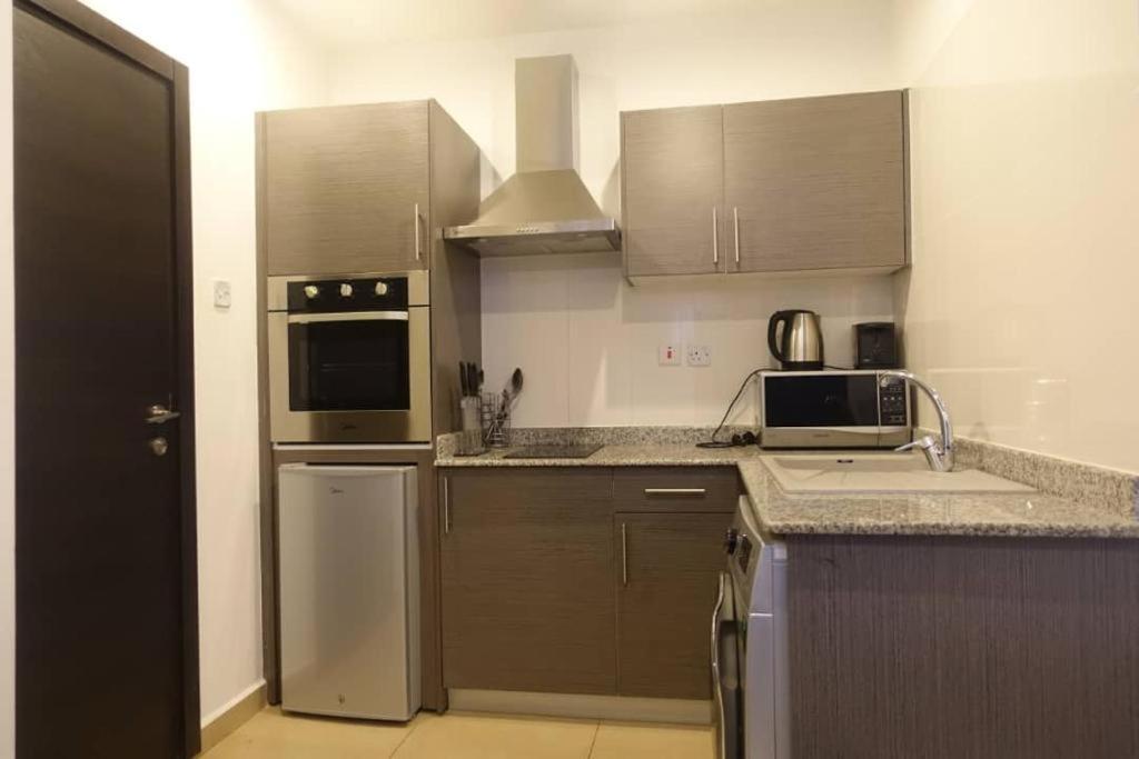 The Gallery Luxury Suites Cpg East Legon Esterno foto
